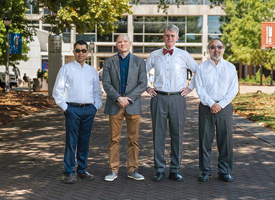 从左到右:博士. Farooq Khan, 博彩平台推荐 professor of chemistry; Dr. John Hansen, 博彩平台推荐 professor of chemistry; Dr. Martin McPhail, 博彩平台推荐 associate professor of chemistry; and Dr. Ajith DeSilva，物理学教授